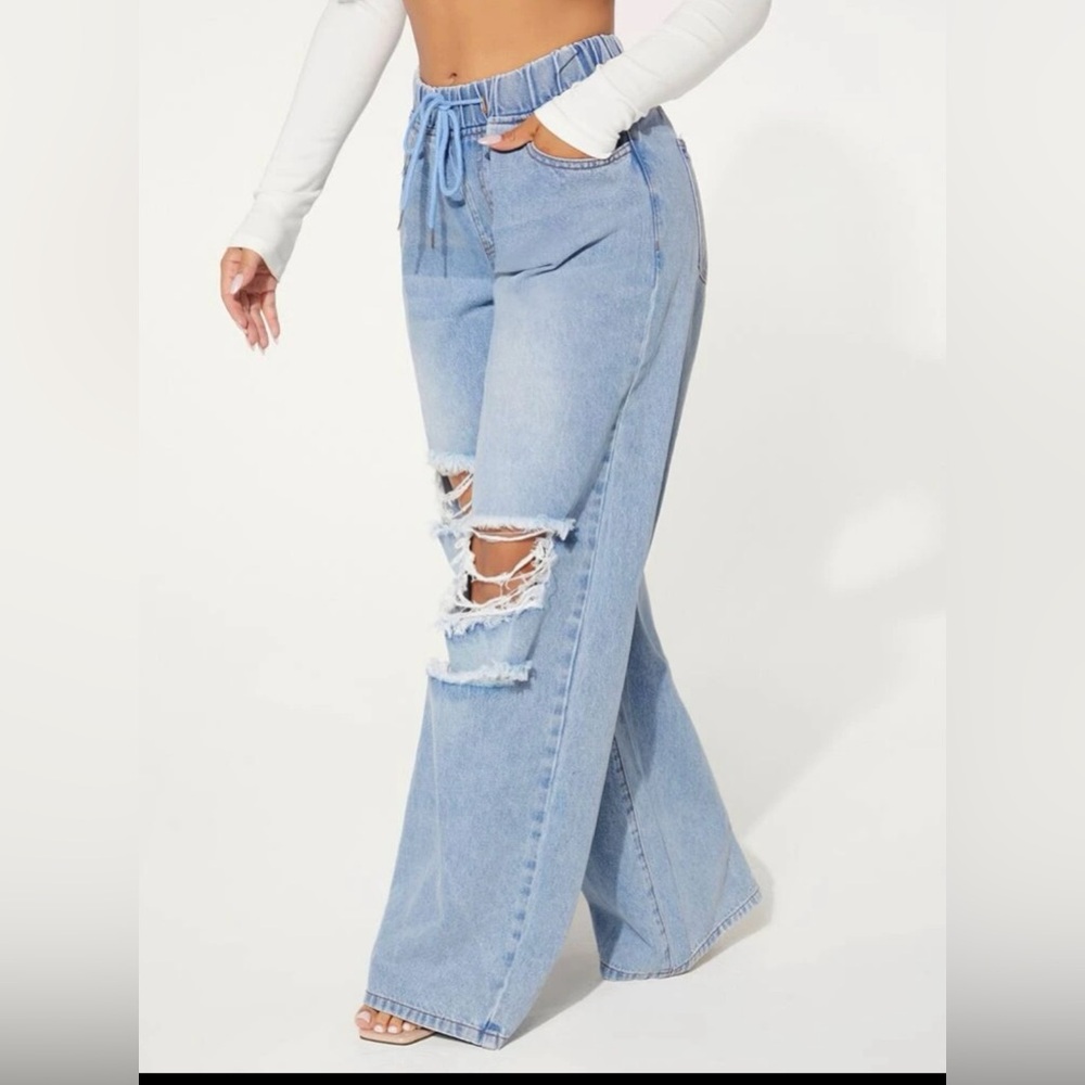 2 Size (4) Jeans from SHEIN worn once.